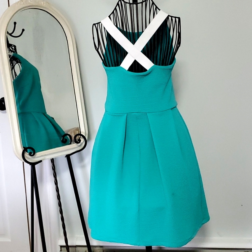 IT'S  Dress size S 96% Polyester 4% Spandex very good condition